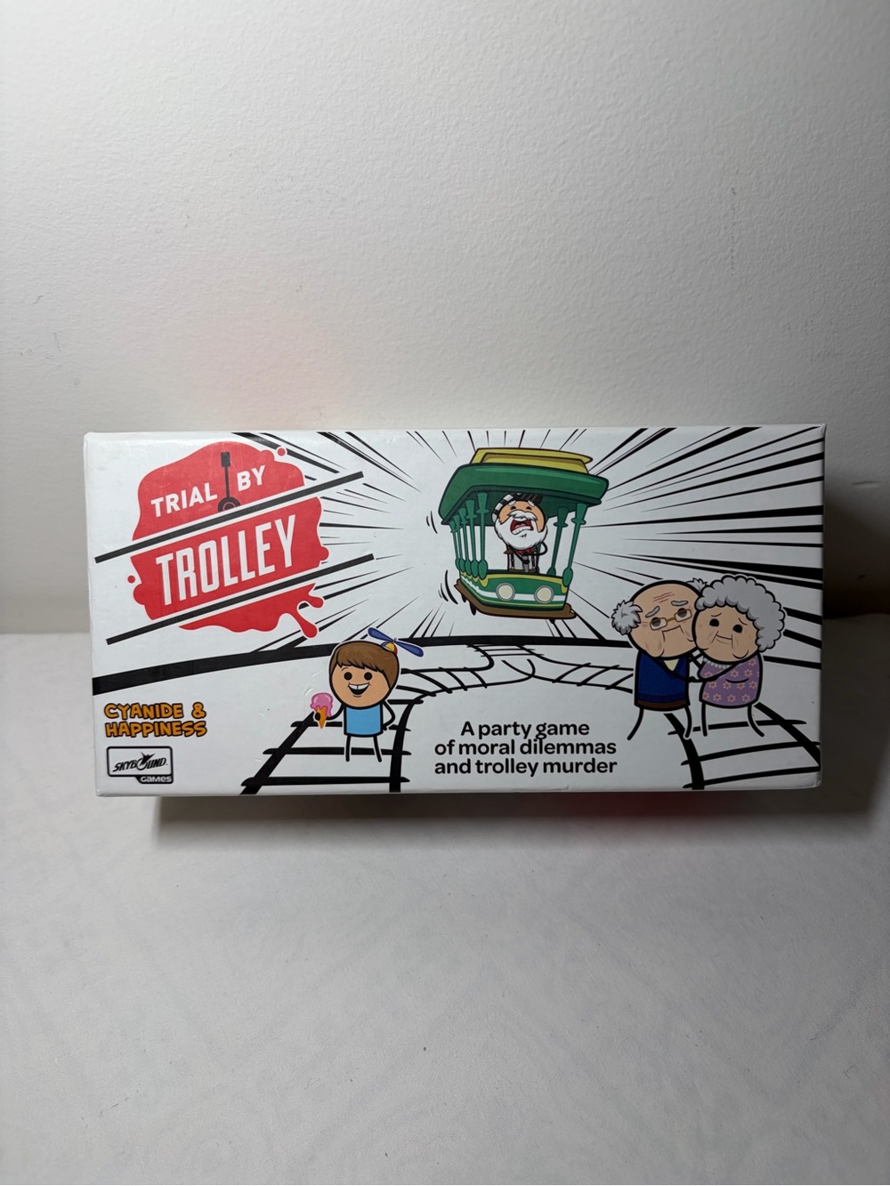 Trial by Trolley Kids Party Game - Cyanide & Happiness (White/Green)